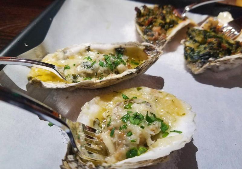 New kid on the block Lewes Oyster House dishes up Chef Sean Corea’s one-of-a-kind favorites alongside a creative bar program. At the risk of sounding like a review (it’s not; find one at RehobothFoodie.com), I urge you to try these charbroiled LOH Tide Oysters lounging in an herb butter sauce and three-cheese blend. Those little bivalves never had it so good. BOB YESBEK PHOTO